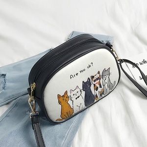 Cute messenger style bag with cat theme Ziggy Twig